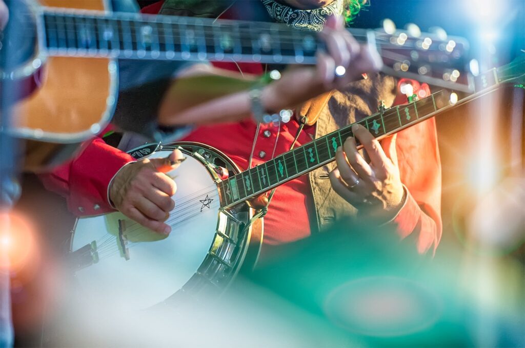 A person playing a banjo